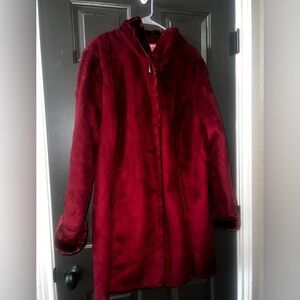 Woman within faux suede and fur coat 1X